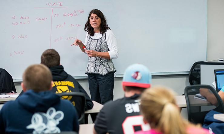 Allison Ambrose in front of class